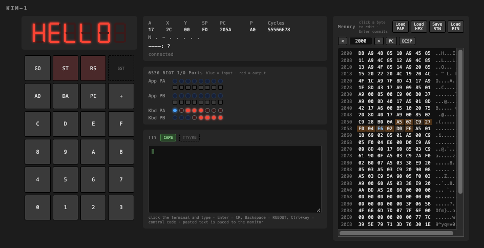 A Tantal program displaying HELLO on the six-digit LED display in the KIM-1 Simulator, with 6502 registers, RIOT ports, and memory visible beside the simulated computer.
