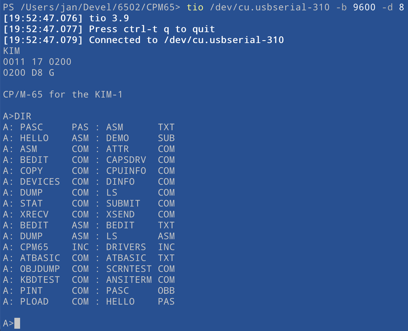 Serial terminal showing a CP/M-65 directory listing from a PAL-2 computer